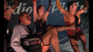Rocky Hooro Picture Show Screenshot Dr. Scott mit Strapsen im Rollstuhl - Sexy!